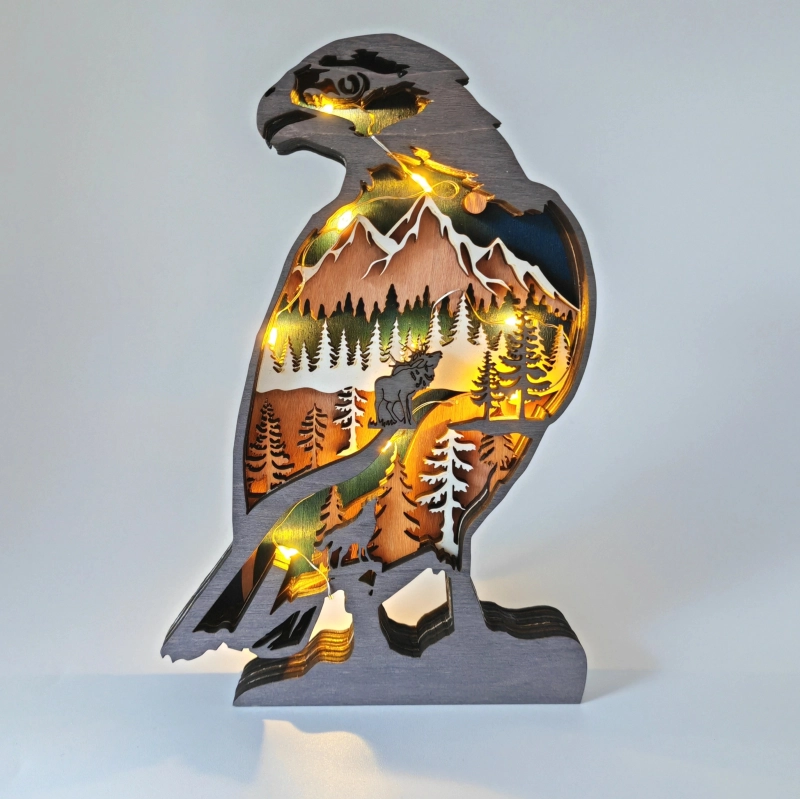 Sculpture rapace des montagnes en bois