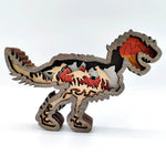 Sculpture dinosaure petit T-rex en bois