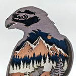 Sculpture rapace des montagnes en bois